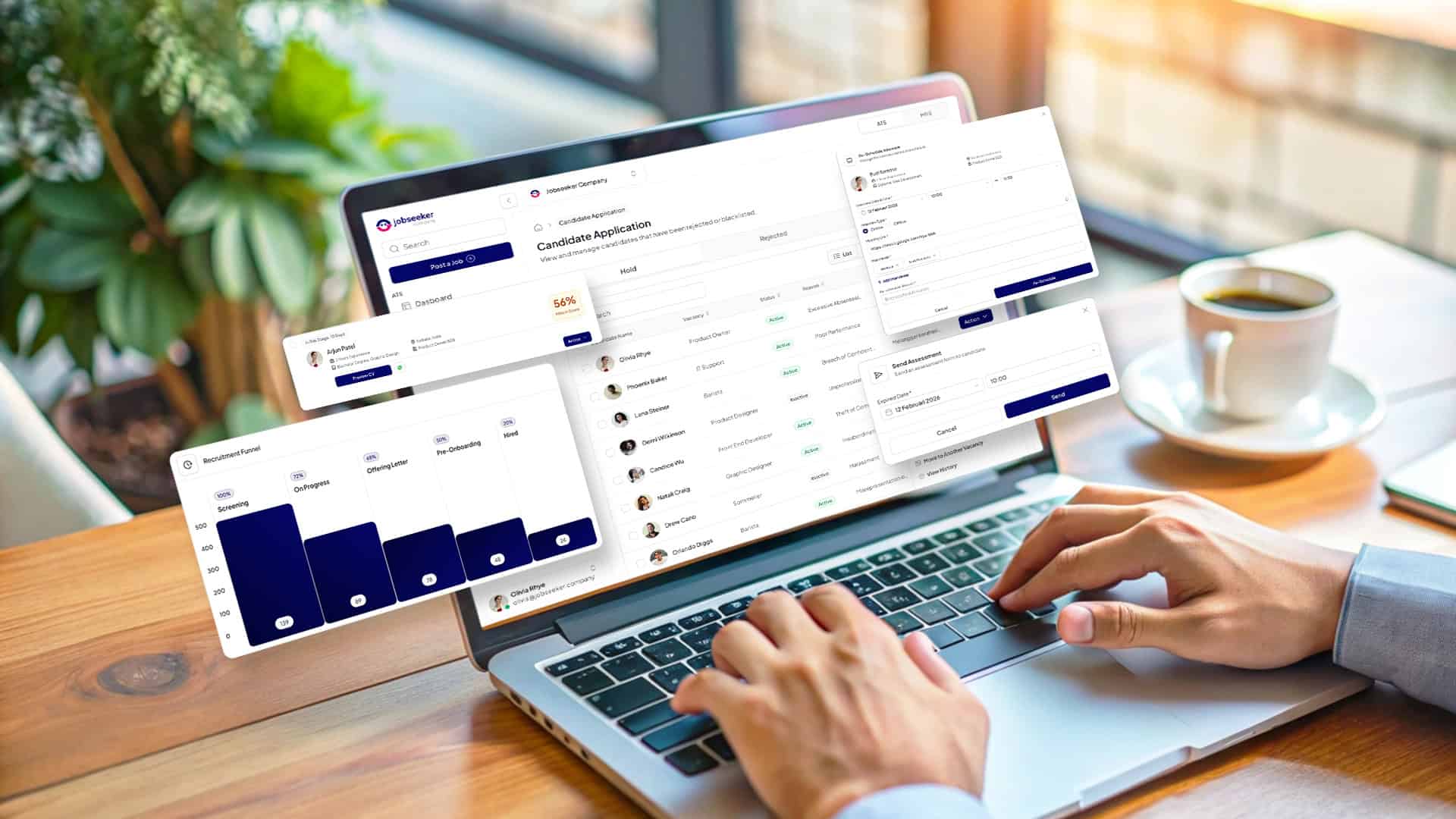 Tangan seseorang sedang mengetik pada laptop yang menampilkan dashboard sistem rekrutmen kandidat dari Jobseeker Company.
